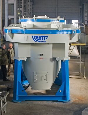 Centrifugal impact grinders